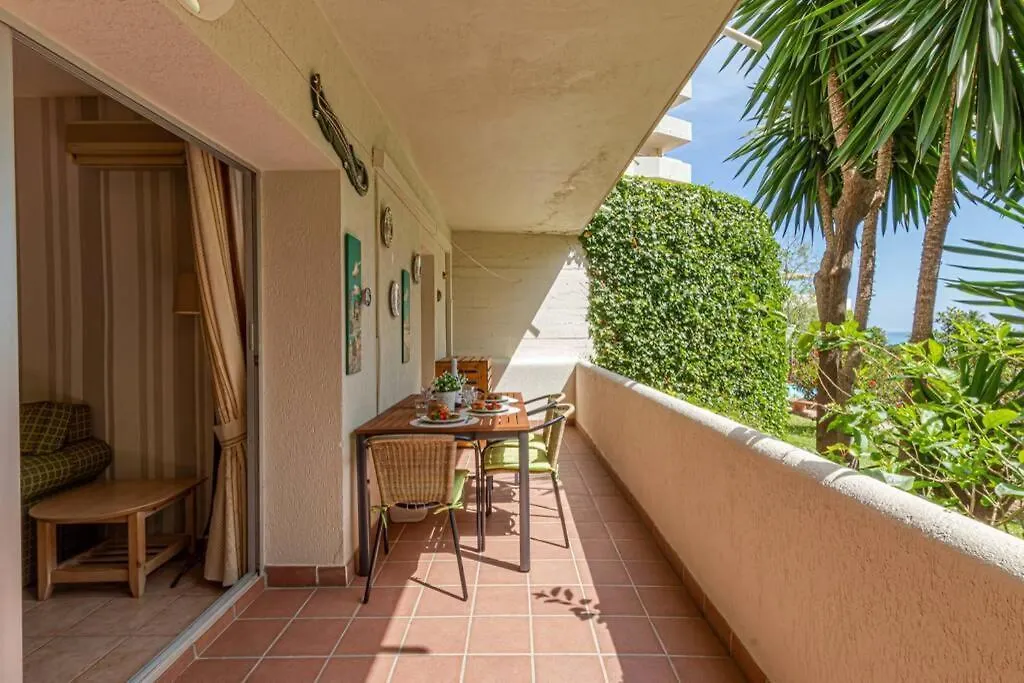 Apartamento 797 Holiday Rentals- Precioso piso con vistas al jardin en Benalbeach Benalmádena